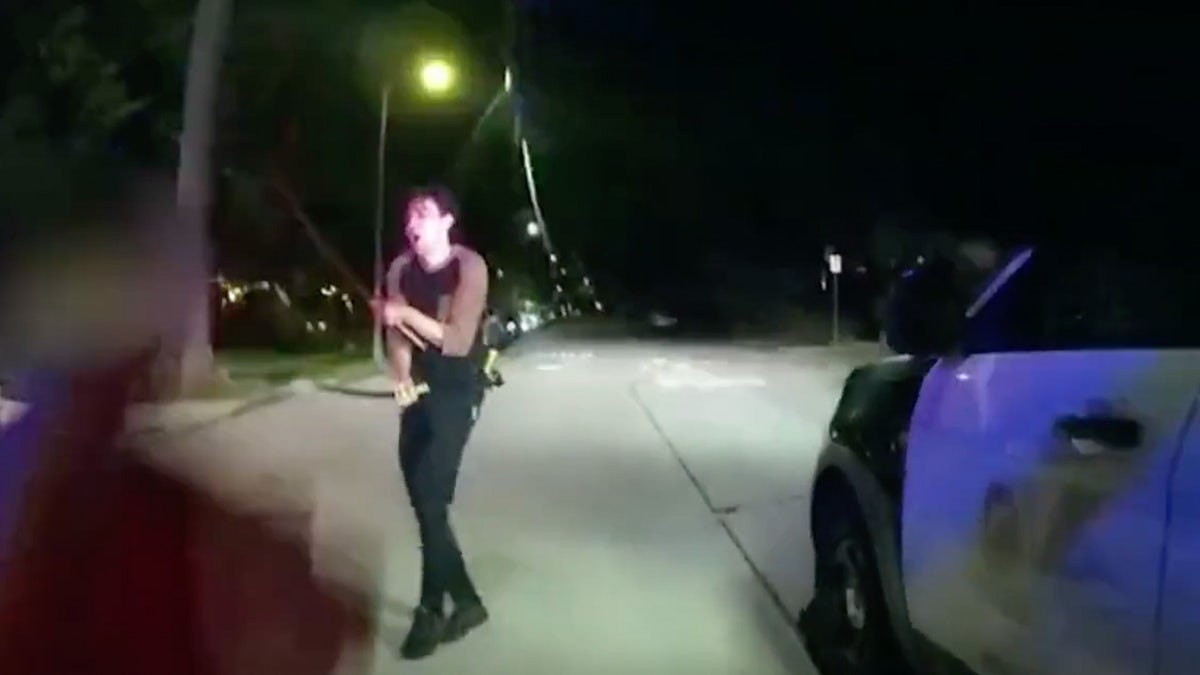 Eric Herrera brandishes a pair of Samurai swords in bodycam footage