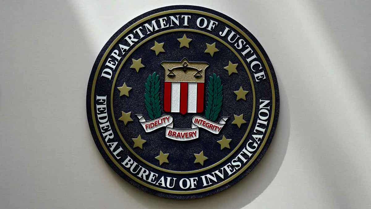 FBI seal hanging on a wall