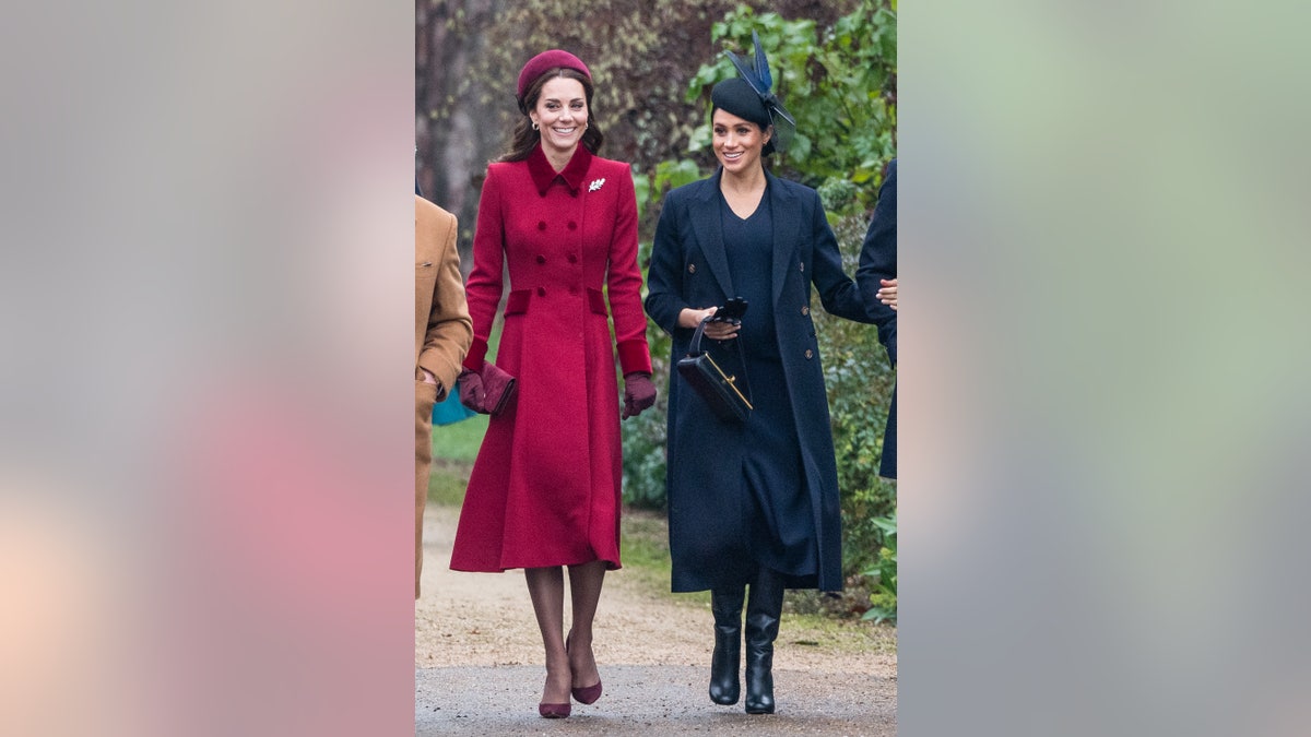 Kate Middleton and Meghan Markle walk side-by-side