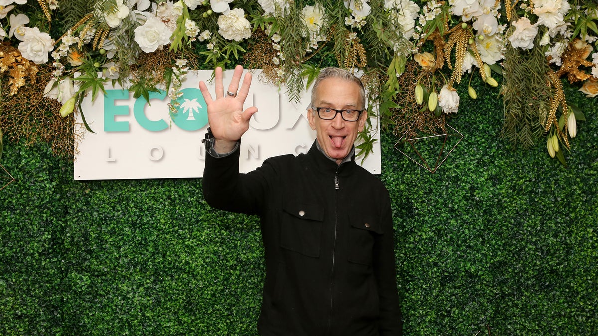 Andy Dick waves