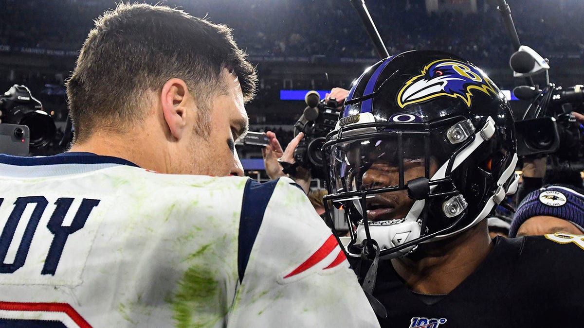 Tom Brady and Lamar Jackson shake hands after a 2019 game