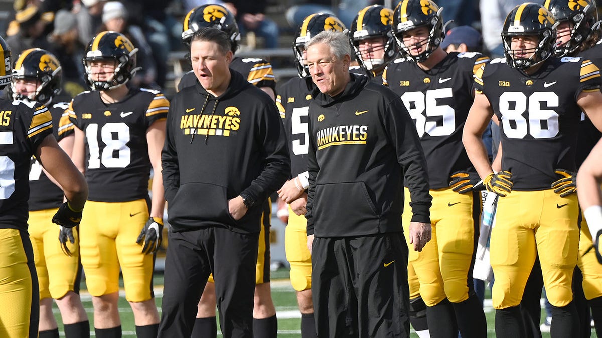 Iowa offensive coordinator Brian Ferentz with Kirk Ferentz