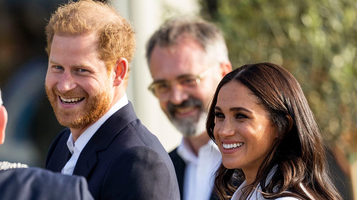 Meghan Markle and Prince Harry smile