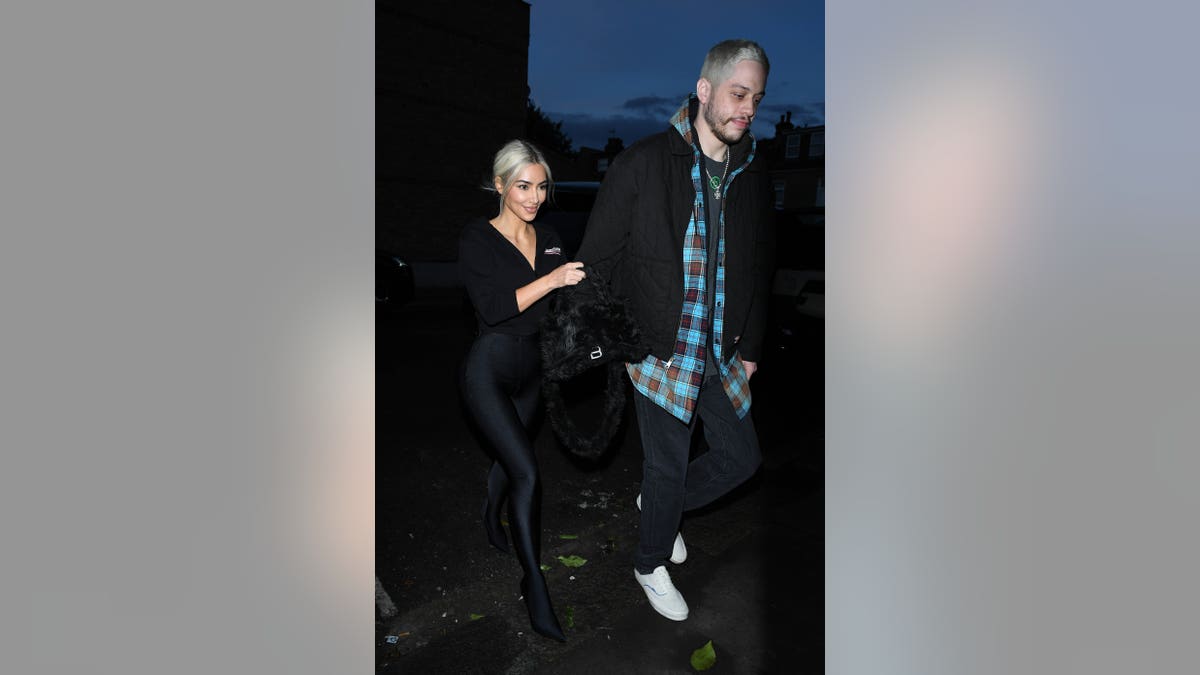 Kim Kardashian and Pete Davidson walking in London