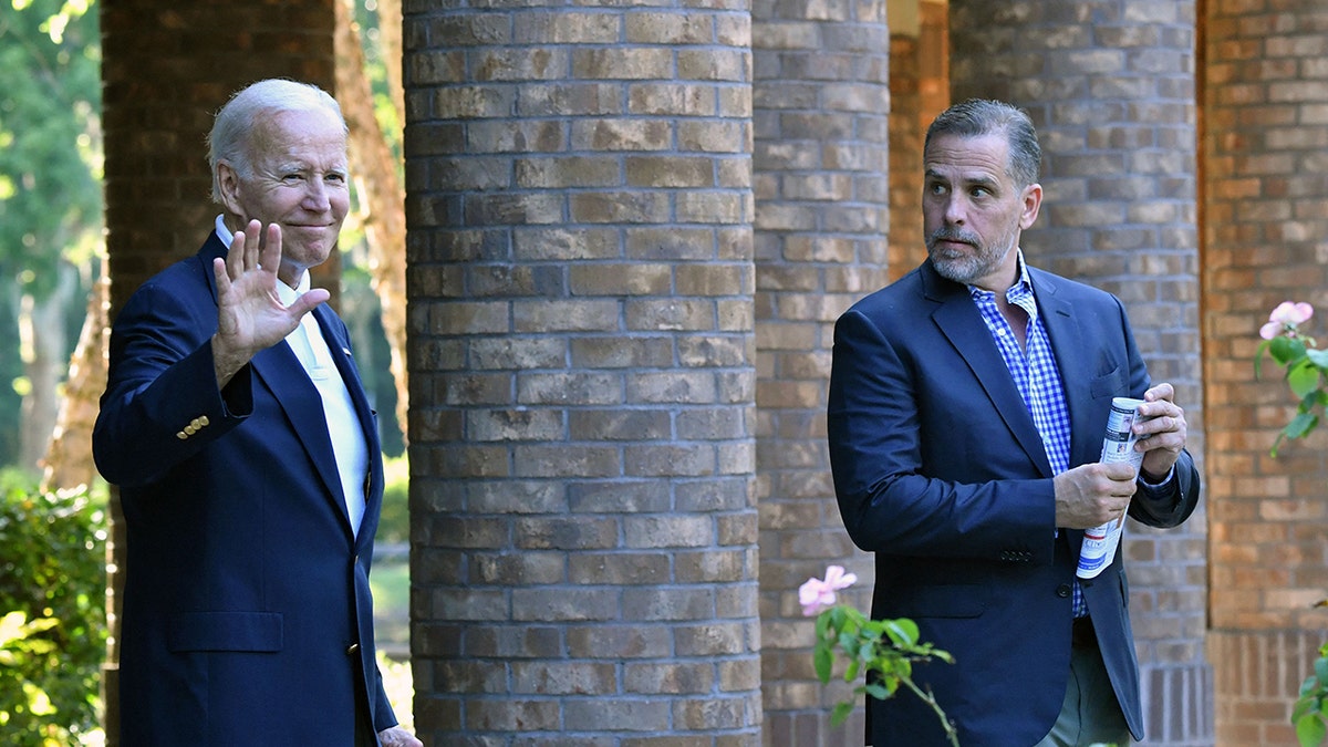 Joe Biden waving with his son, Hunter Biden