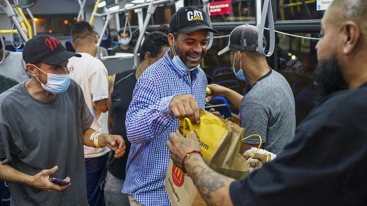 Migrants getting food