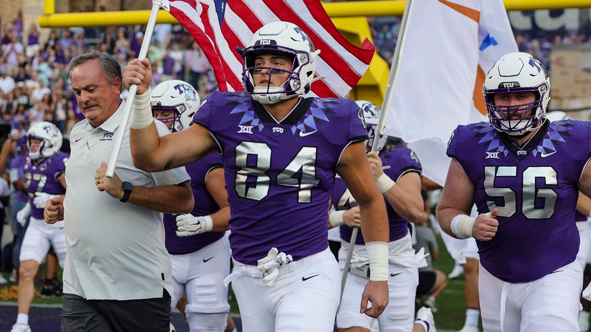 TCU runs onto the field before a game