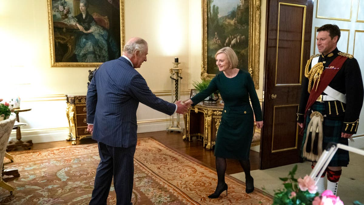 Prime Minister Liz Truss shook hands with King Charles III