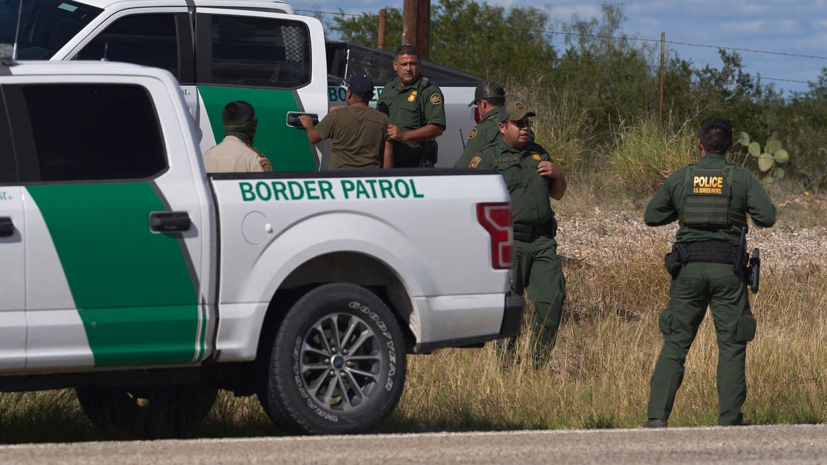 U.S. Border Patrol Honor Guard escorts flag at PBR Global Cup, Texan News  Service