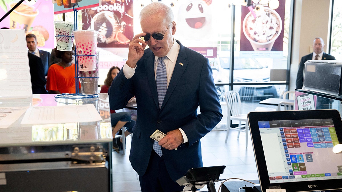 A photo of Biden ordering an ice cream