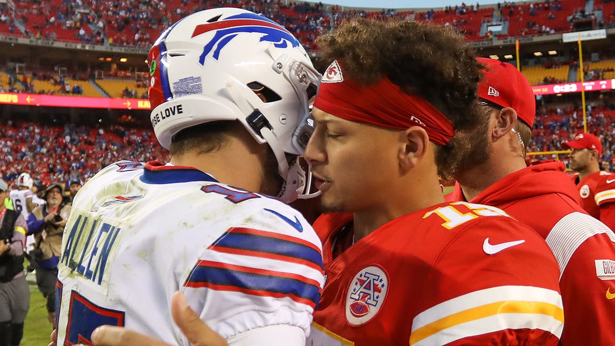 Patrick Mahomes and Josh Allen embrace