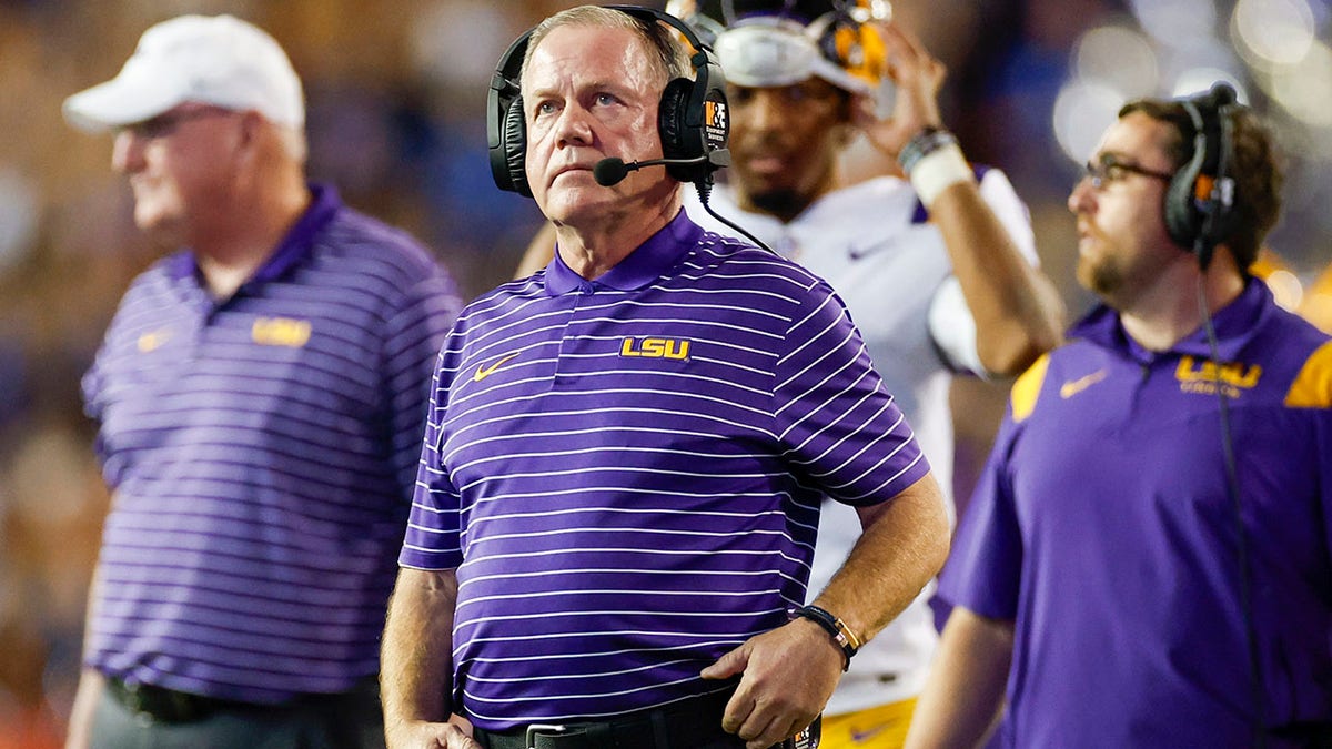 Brian Kelly looks on against Florida