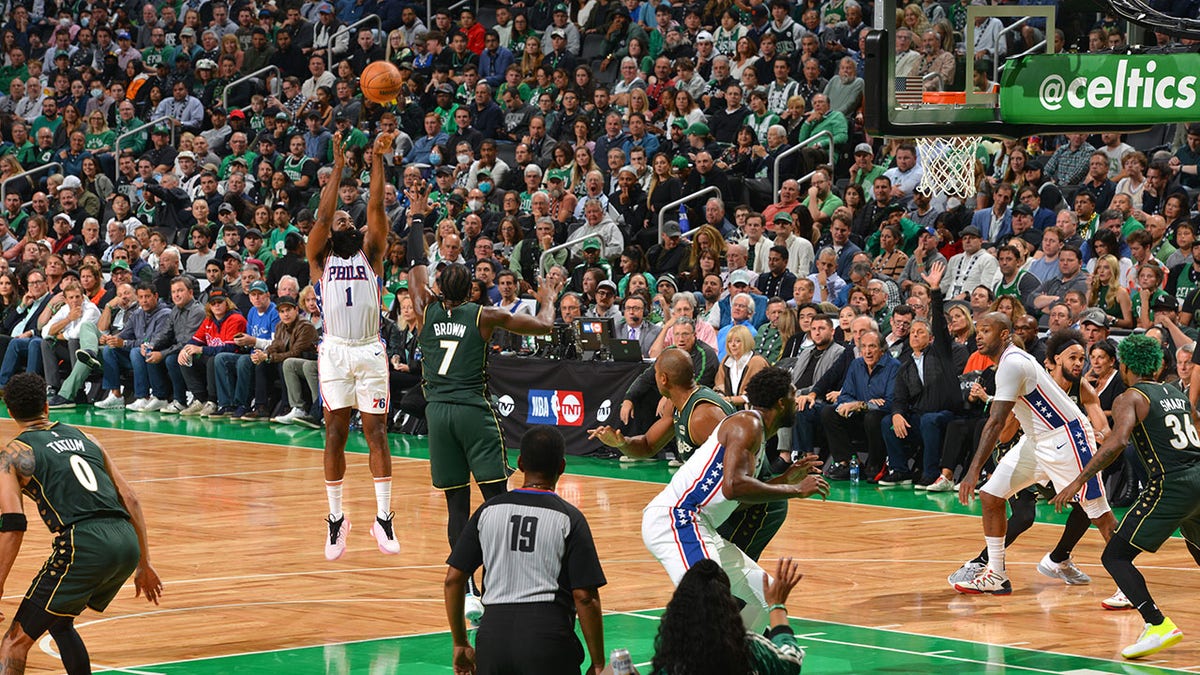 James Harden shoots a three against the Celtics