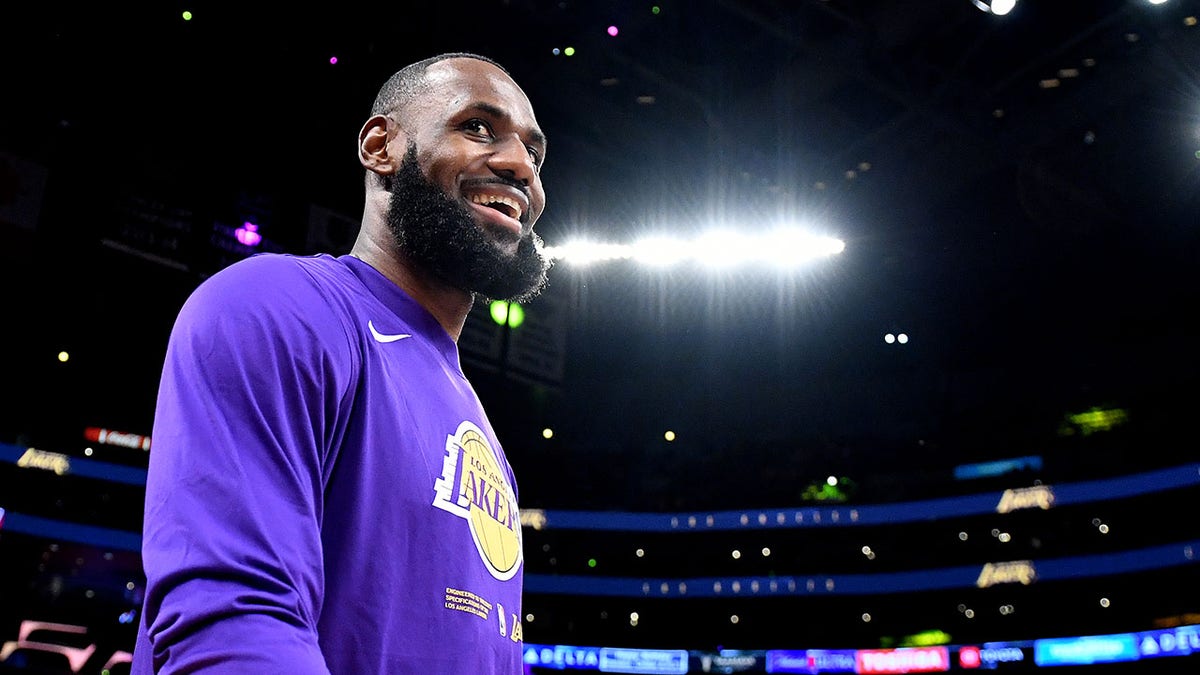 LeBron James smiles before a game
