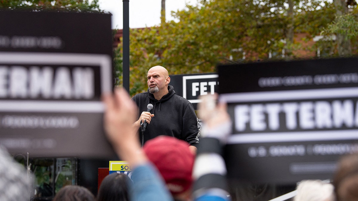 A photo of John Fetterman speaking with supporters