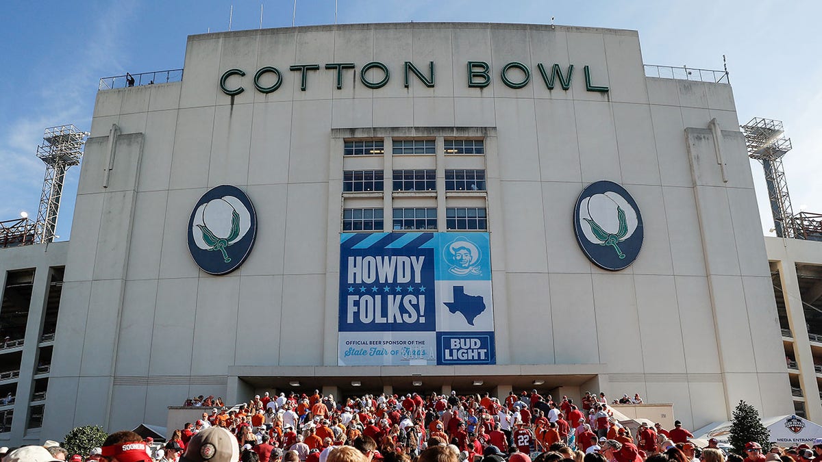 Fans arrive at the Cotton Bowl in 2021