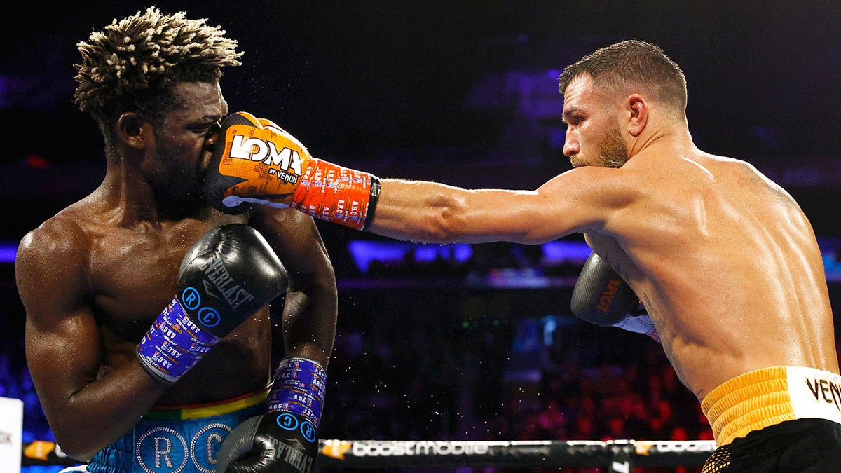 Vasiliy Lomachenko throwing a punch