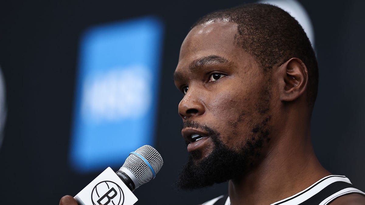 Kevin Durant speaks to the media