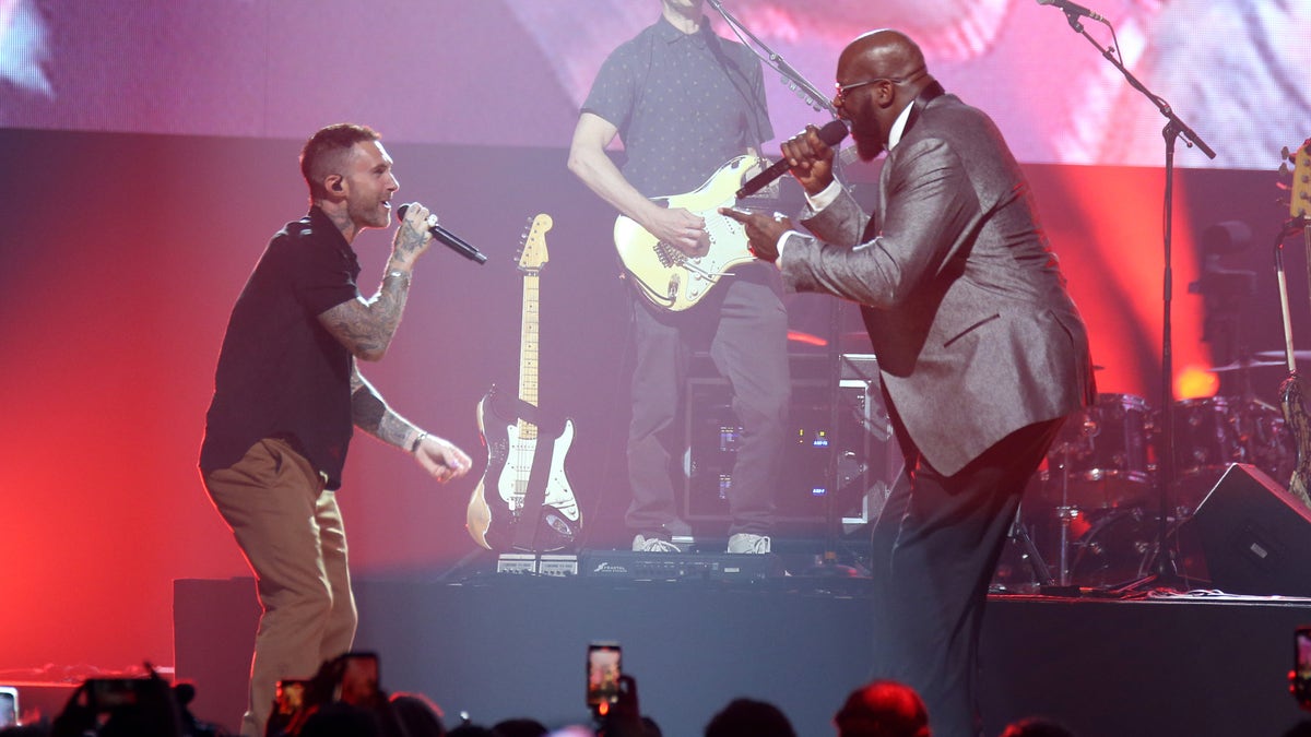 Adam Levine and Shaq perform