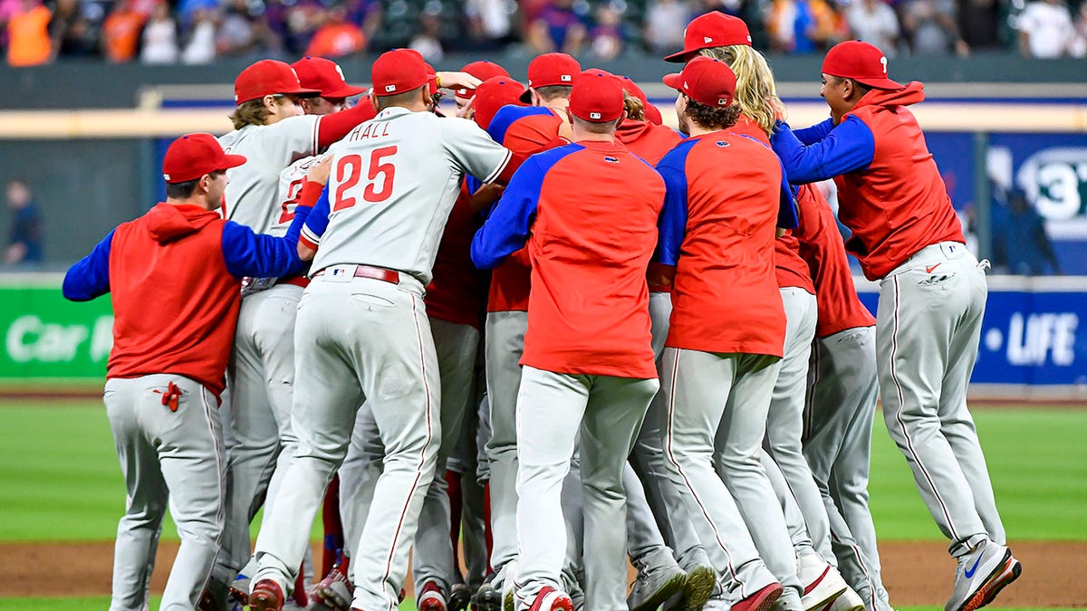 The Phillies celebrate after securing a Wild Card spot