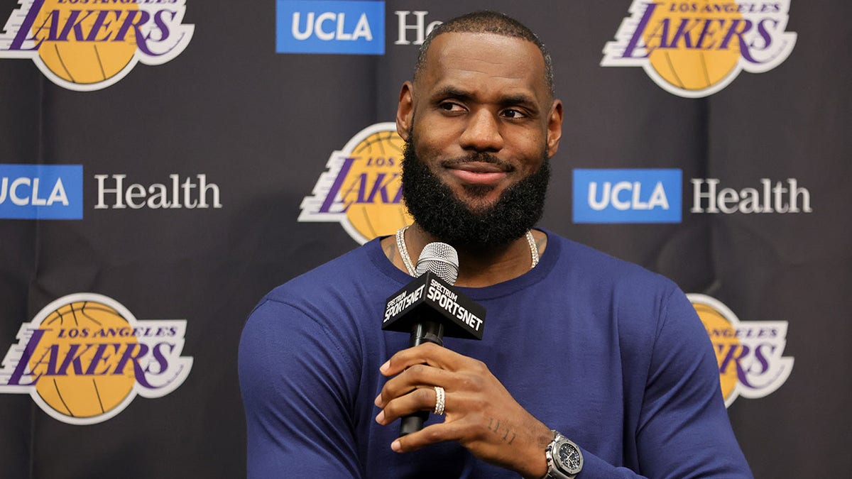 LeBron James speaks to the media after a preseason game