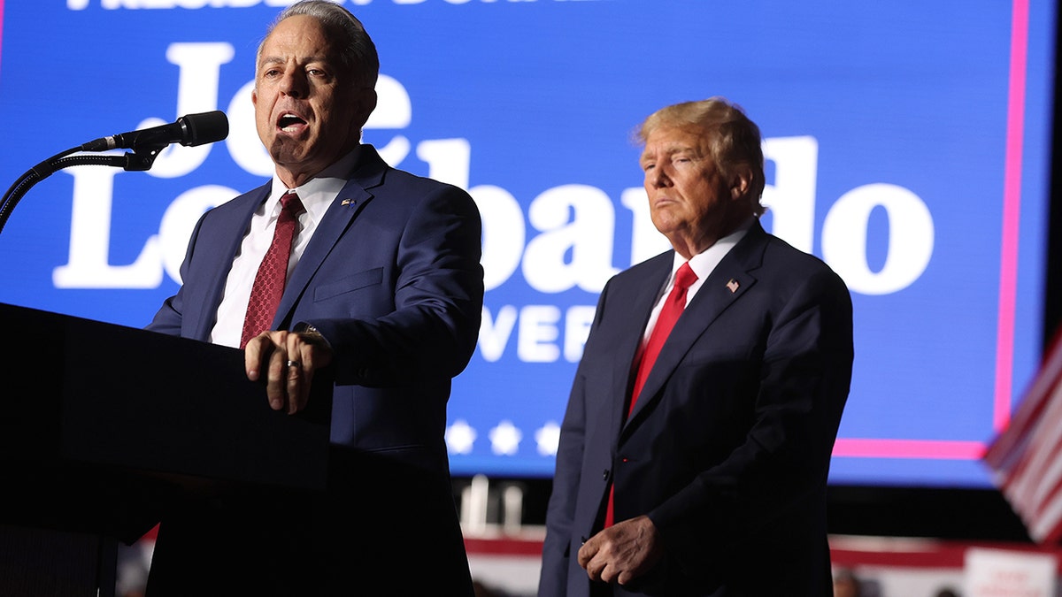 Trump standing behind Joe Lombardo