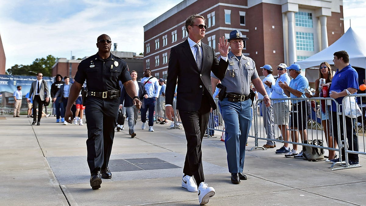 Lane Kiffin before a game against Auburn