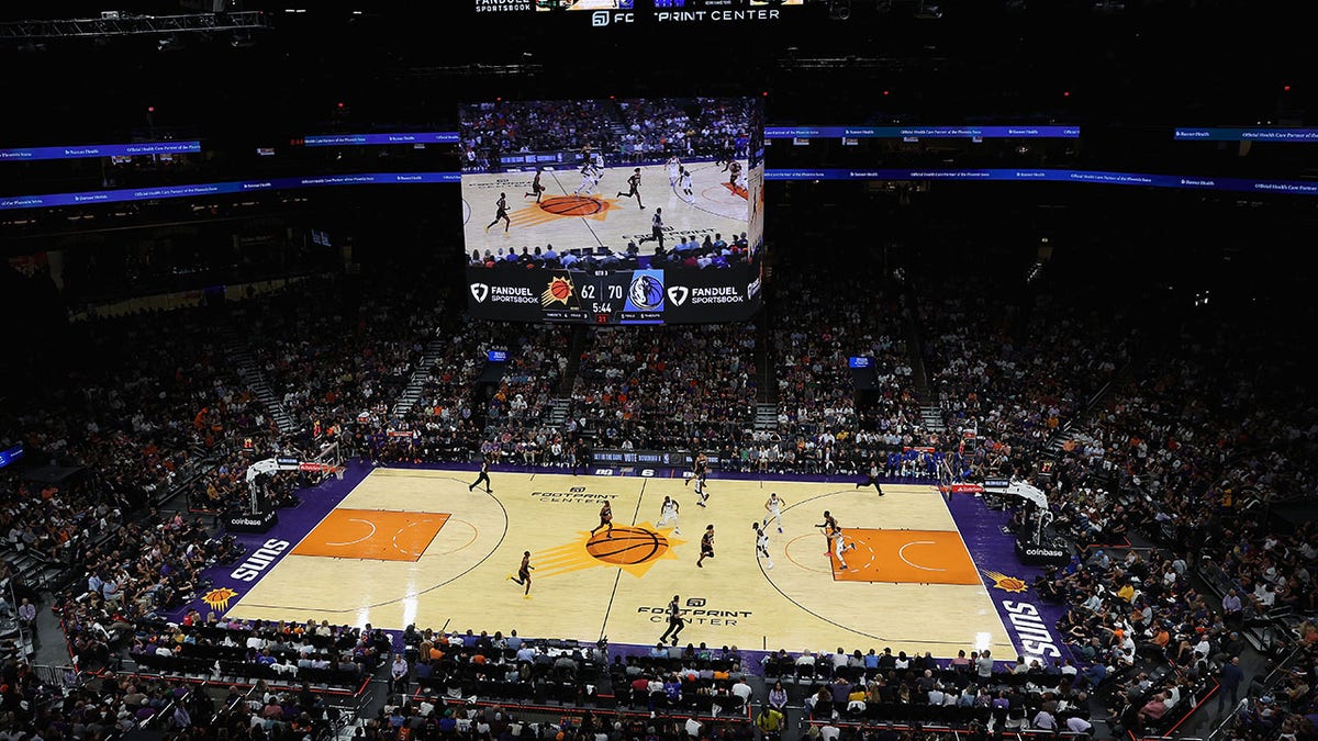 Action during the second half of the NBA game between the Phoenix Suns and the Dallas Mavericks at Footprint Center on October 19, 2022, in Phoenix, Arizona. The Suns defeated the Mavericks 107-105. 