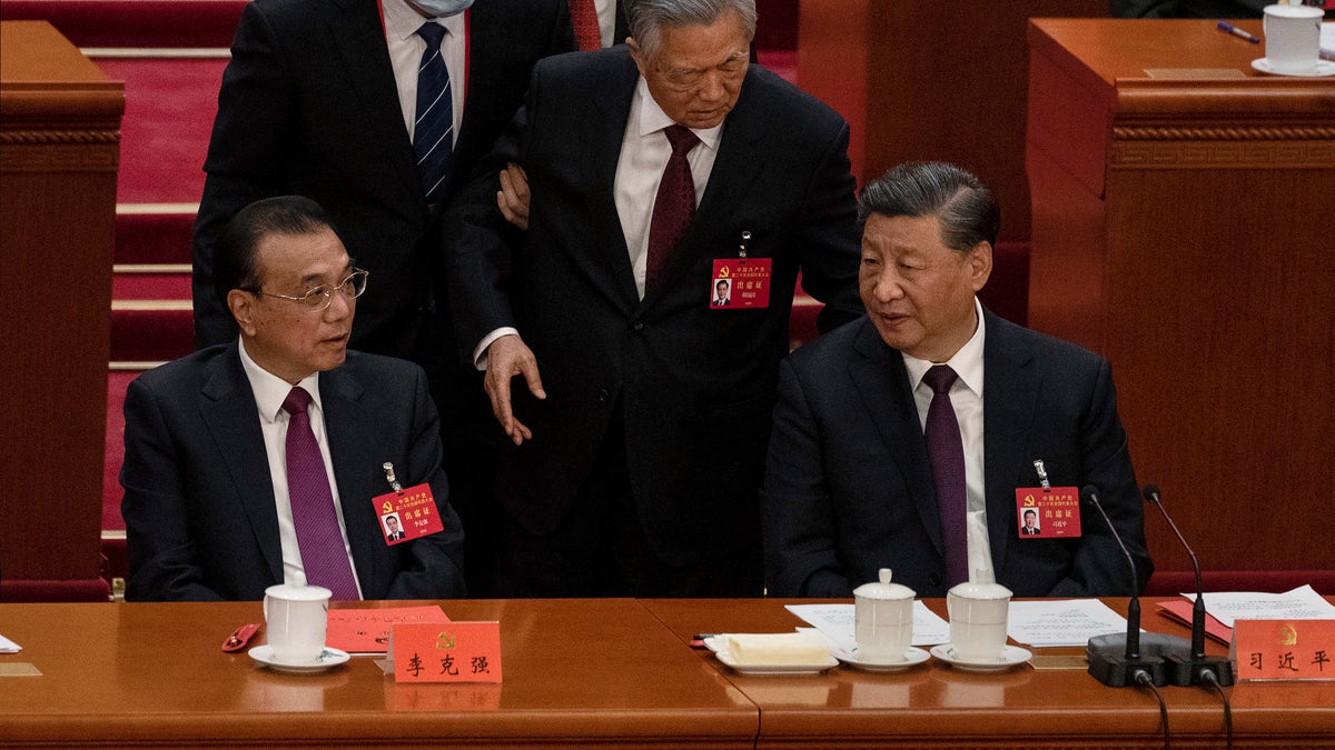 Drama at Chinese Communist Party summit: Xi predecessor Hu Jintao hauled out