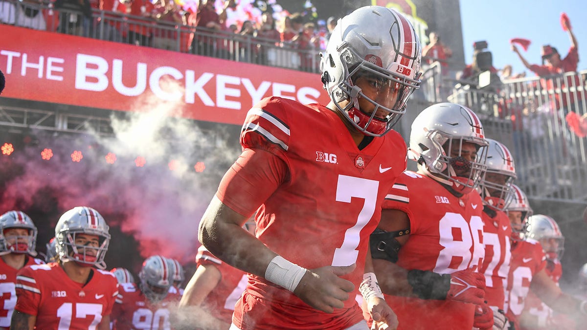 C.J. Stroud of Ohio State runs onto the field