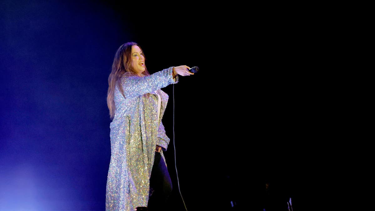 alanis morissette performing on stage