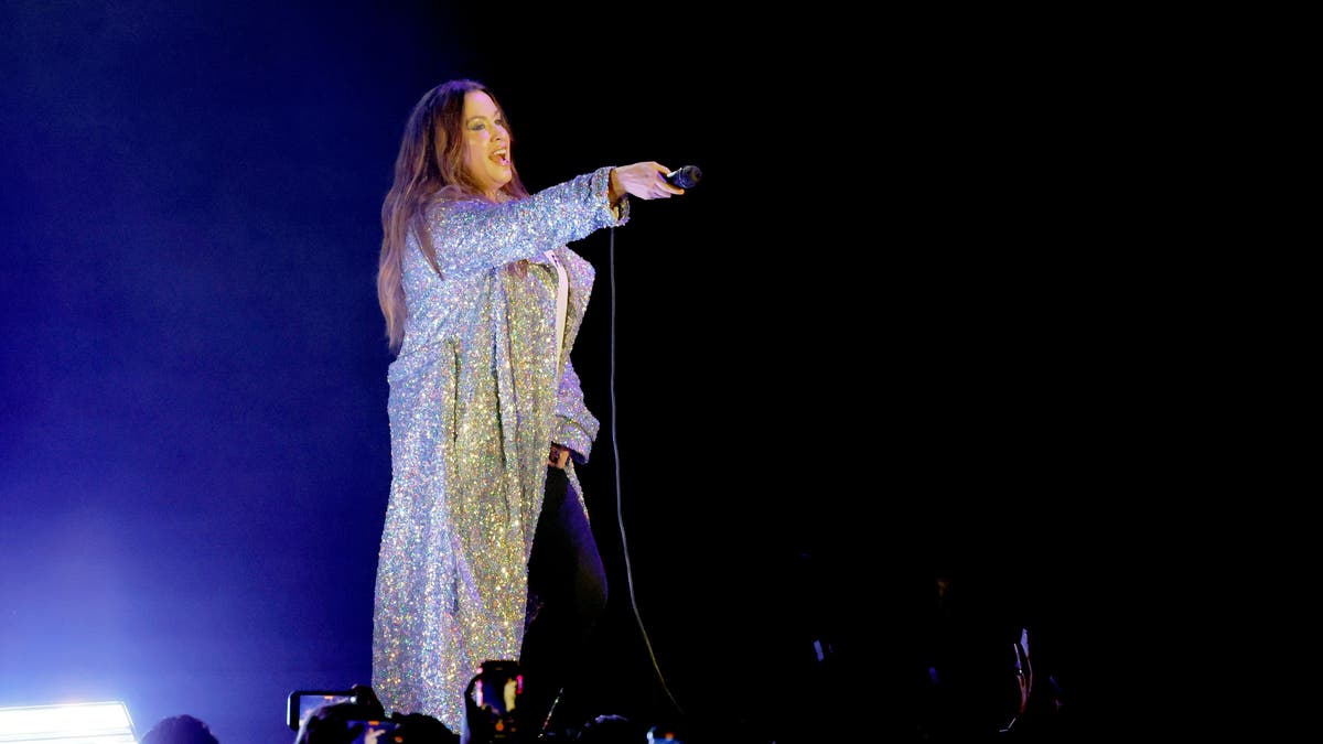 alanis morissette performing on stage