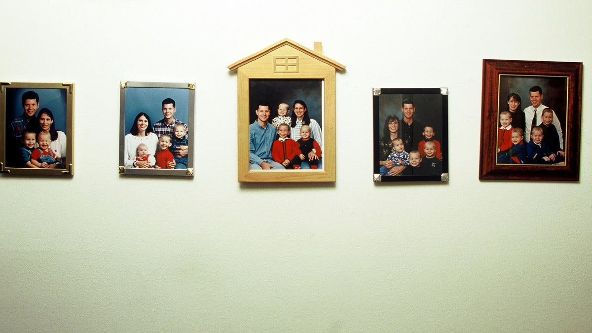 Andrea Yates family portraits hung on wall