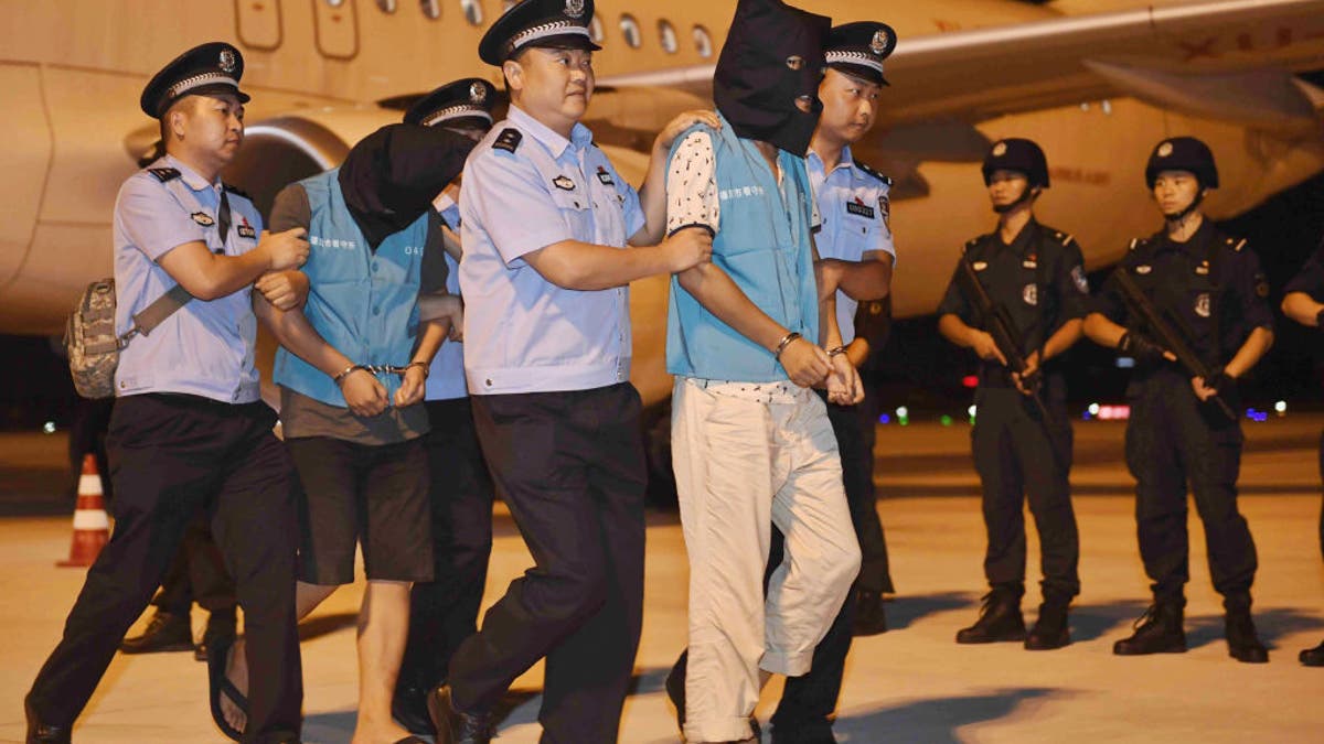 China brings suspects back from cambodia