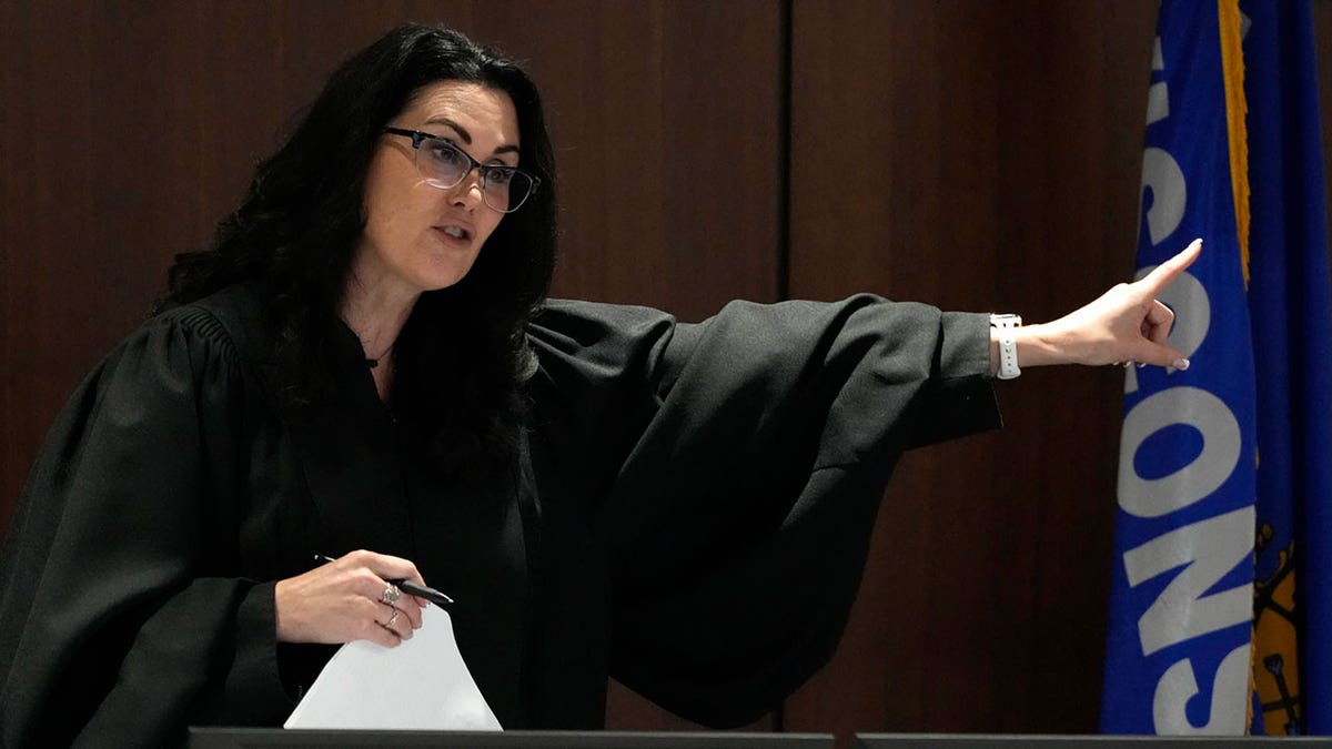 Waukesha County Circuit Court Judge Jennifer Dorow addresses Darrell Brooks as he appears in a Waukesha County Circuit Court before jury selection in Waukesha on Monday, Oct. 3, 2022. Brooks, who is representing himself during the trial, is charged with?driving into the?Waukesha Christmas Parade?last year killing six people and injuring dozens more. He faces six counts?of first-degree intentional homicide and 71 other counts.