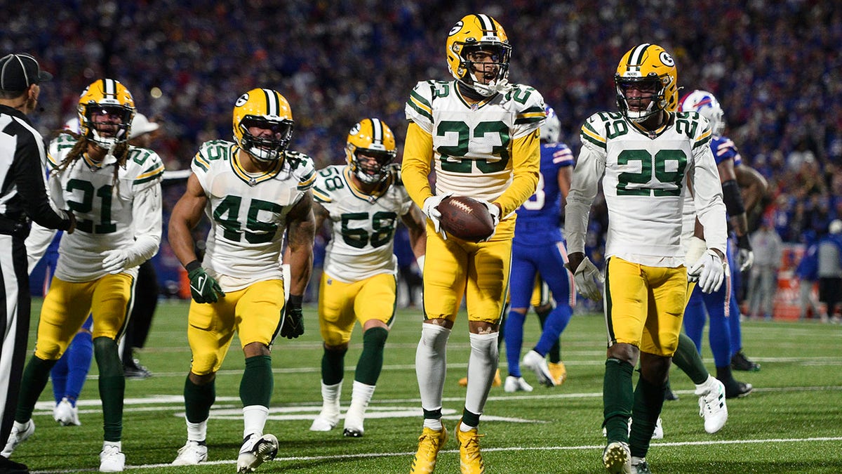 Jaire Alexander intercepts a pass