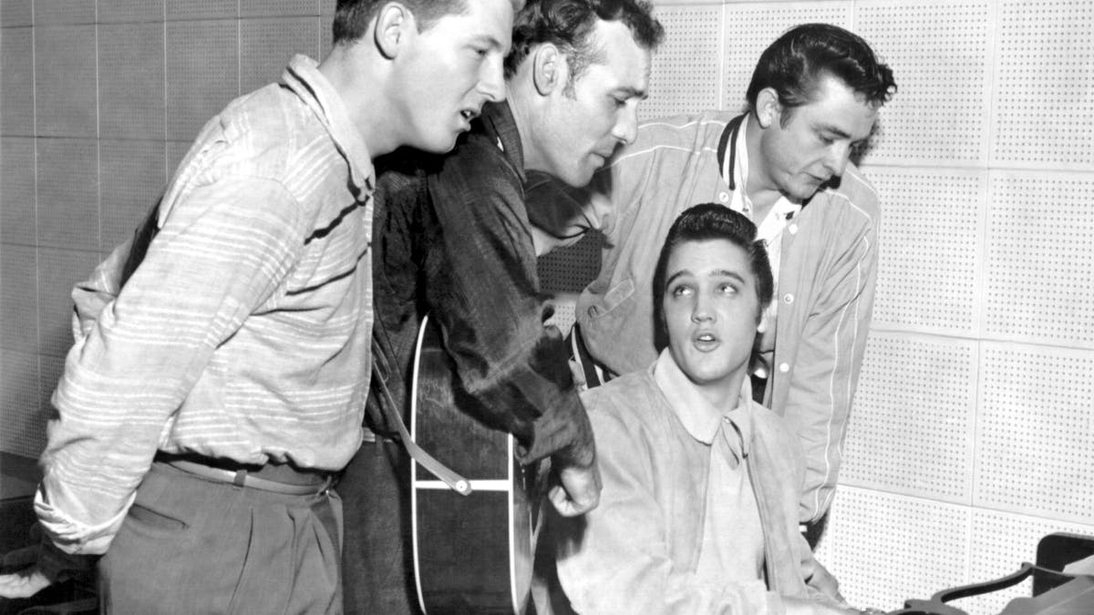 Jerry Lee Lewis, Carl Perkins, Elvis Presley and Johnny Cash at the piano