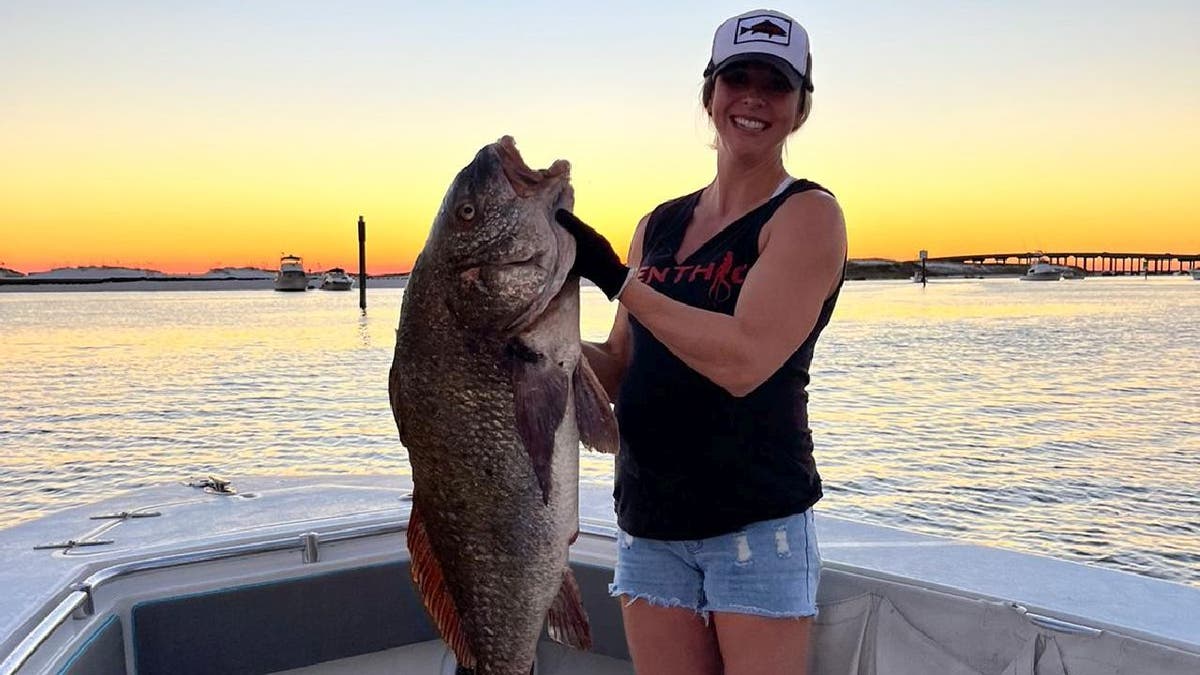 Florida woman, 8 months pregnant, polespears fish for potential