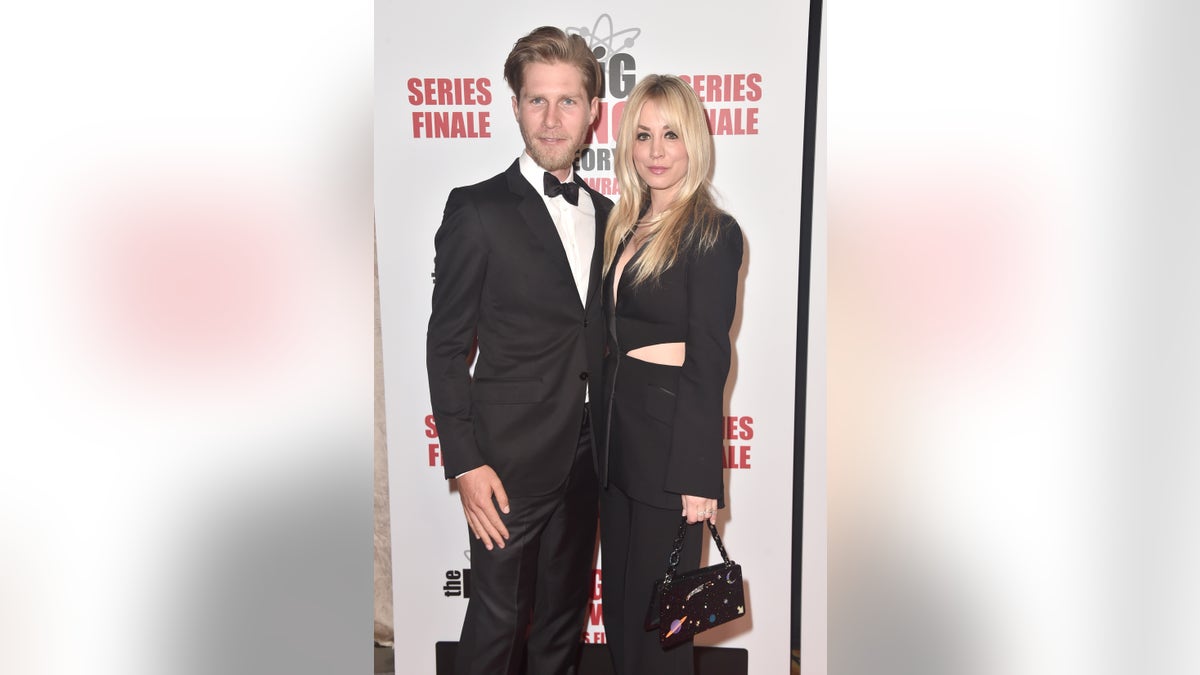 Kaley Cuoco and Karl Cook smile on red carpet