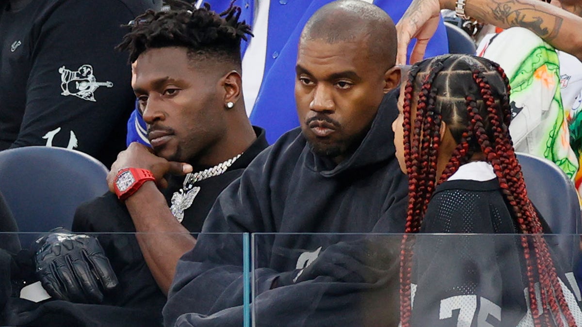 Antonio Brown and Kanye West at a football game