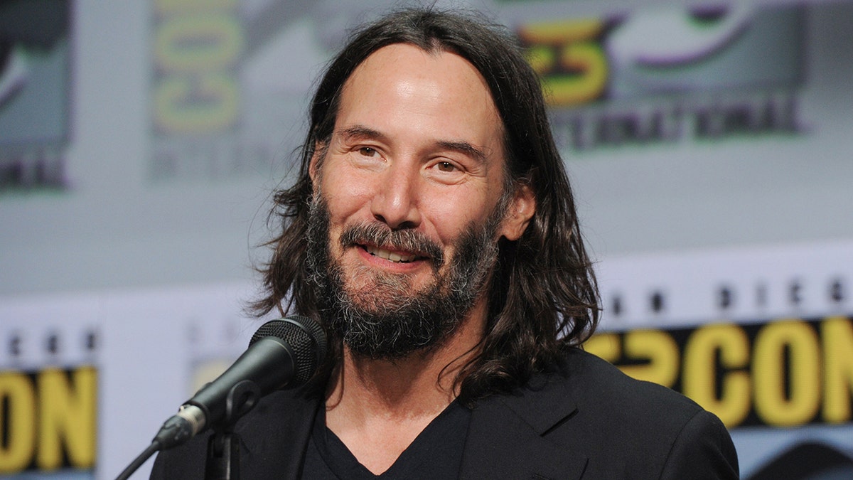 Keanu Reeves on stage at Comic-Con