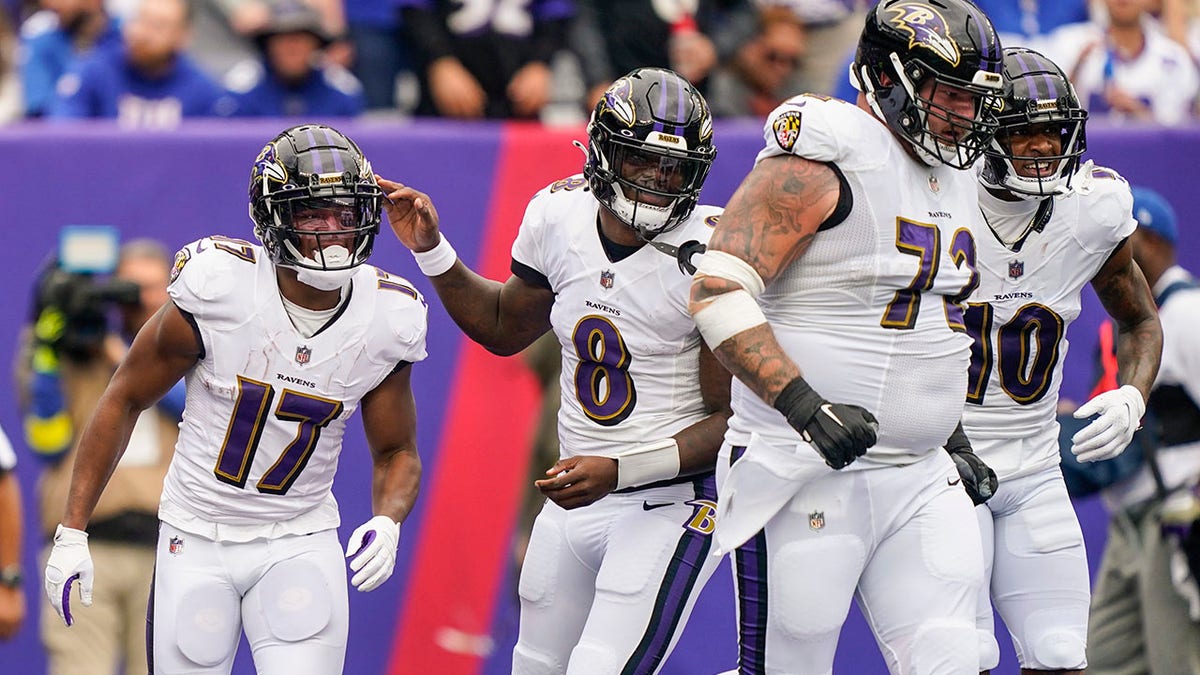 Lamar Jackson celebrates a touchdown