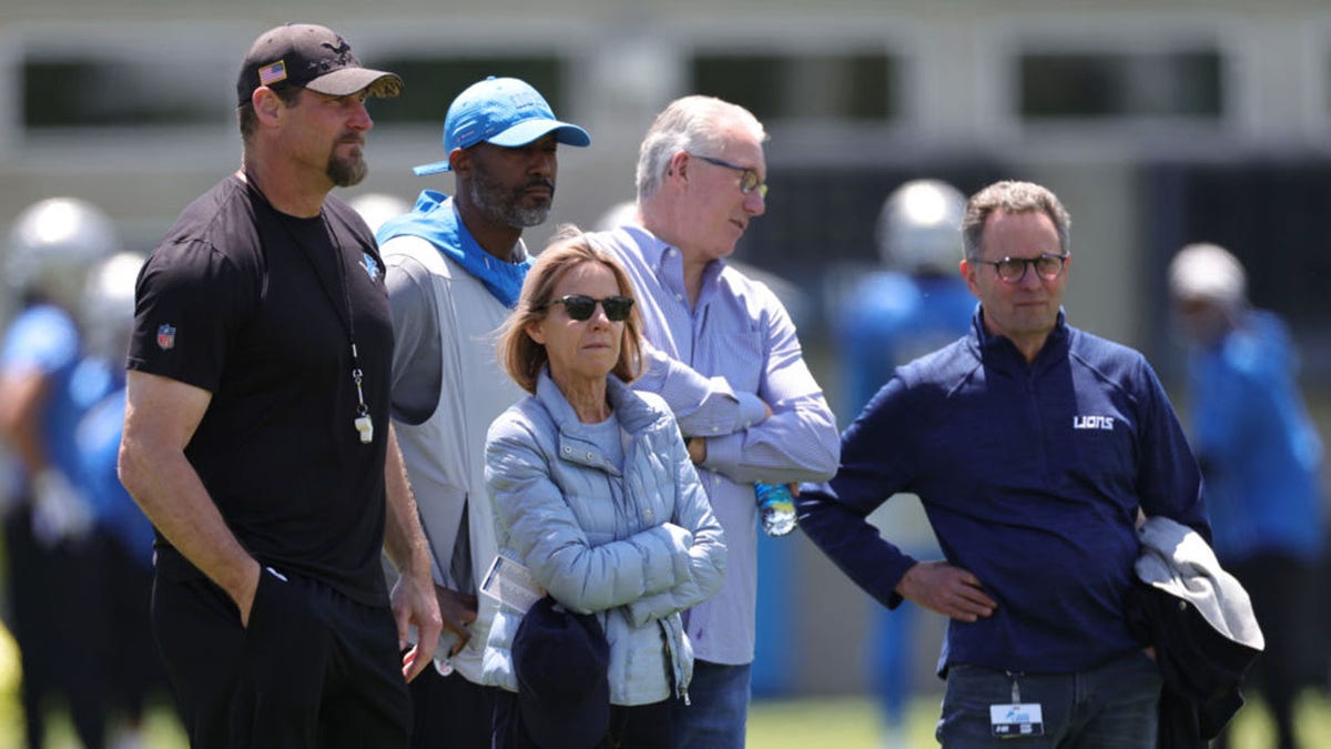 Owner and Chairman Sheila Ford with Dan Campbell and GM Brad Holmes