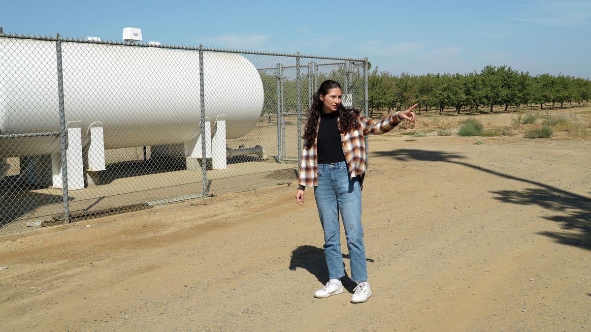 Madeline Harris standing at a municipal well during a drought