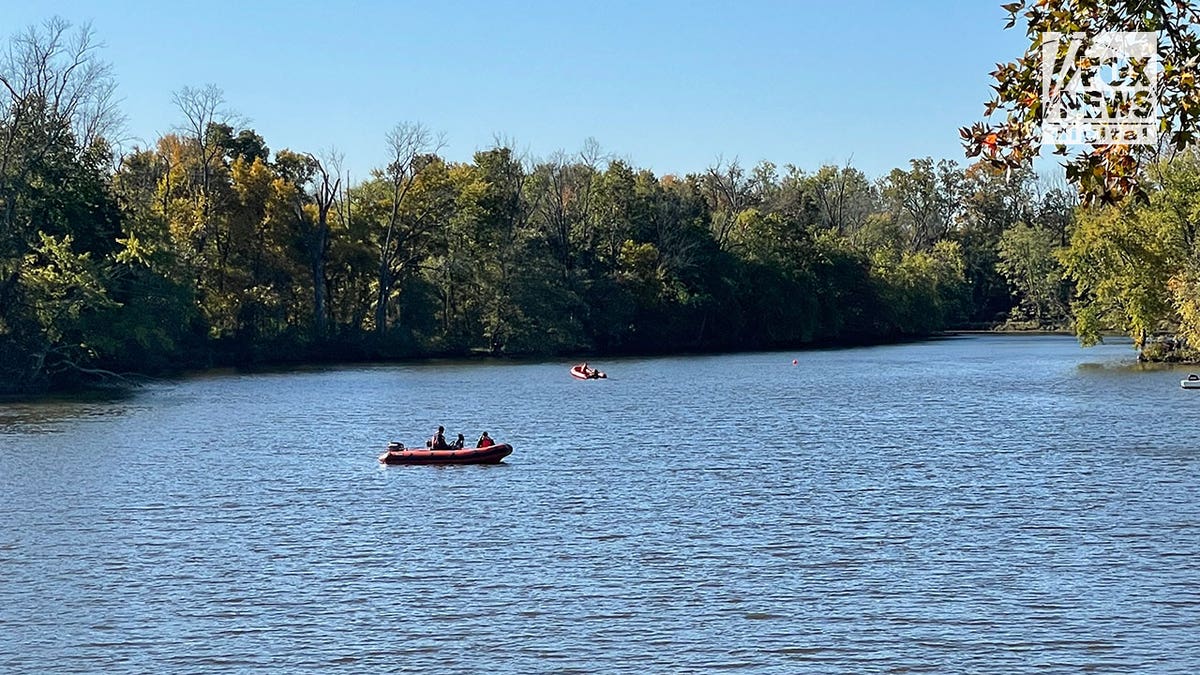 Princeton rescue officers searching water in boats for missing Princeton student