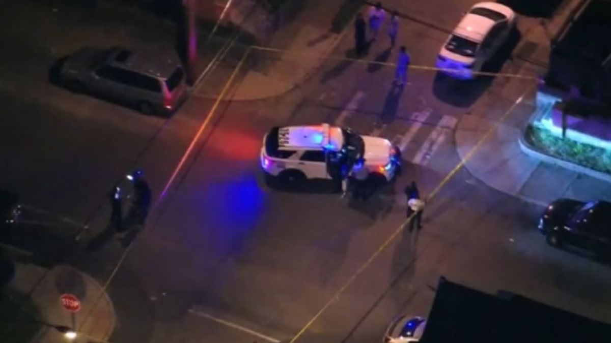 police car at intersection where boy was shot