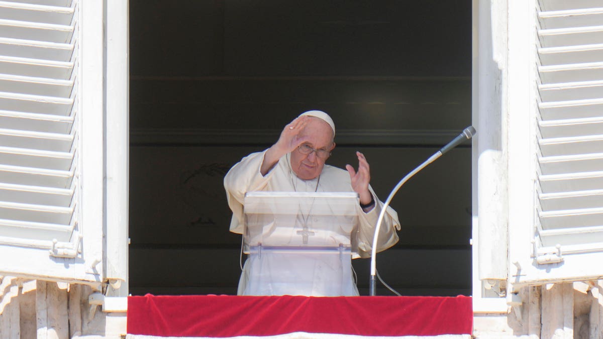Pope at his window overlooking St. Peter's Square
