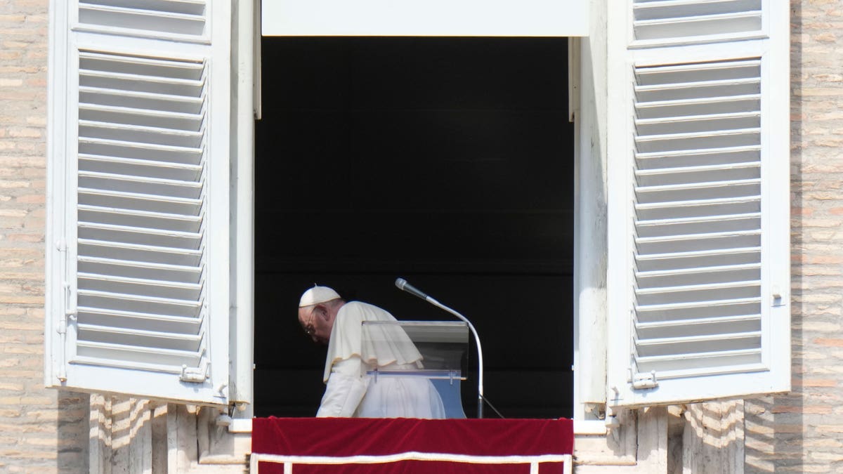 The Pope leaving the podium after prayer