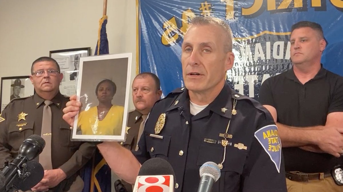 Sgt. Carey Huls speaks at a press conference 