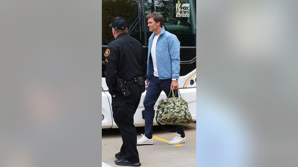Tom Brady headed to football game